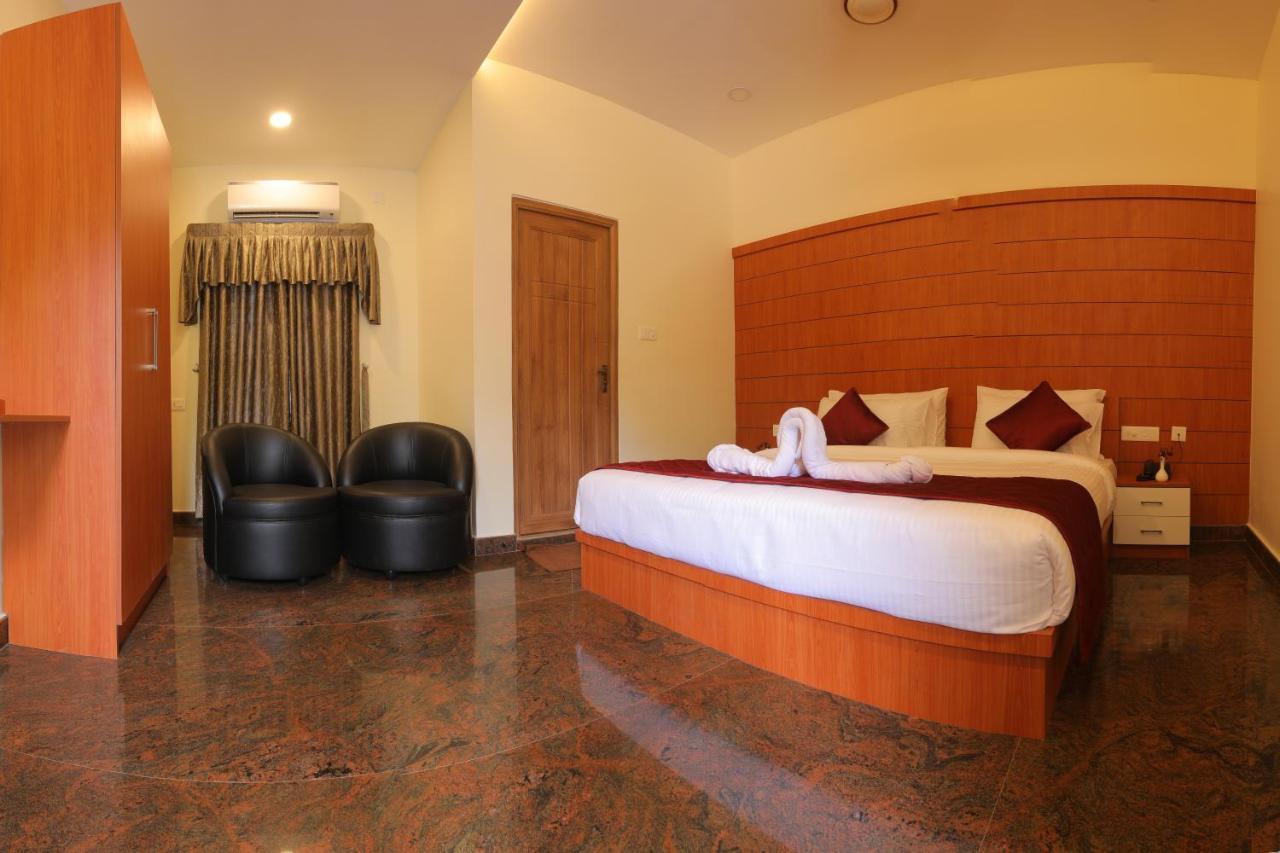 Thenmala Hormuz Inn Kolattupuzha Екстериор снимка