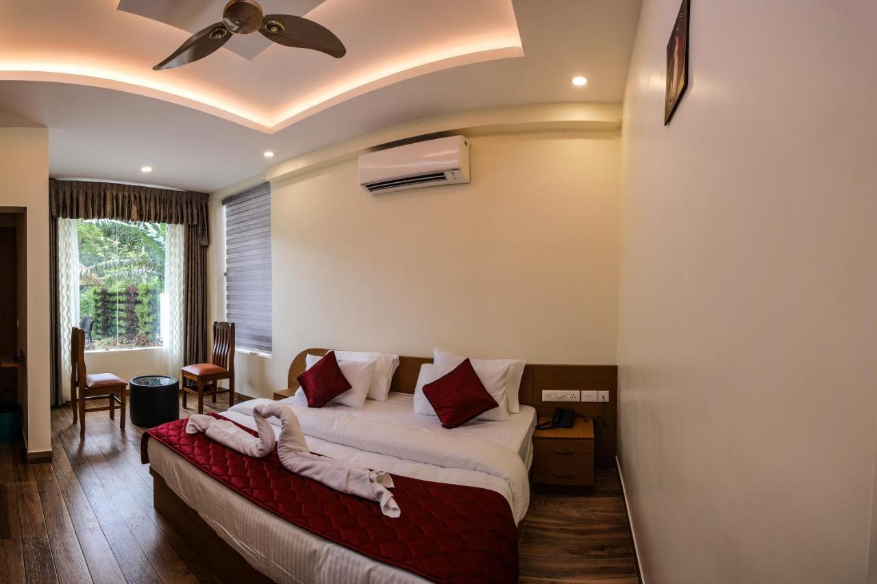 Thenmala Hormuz Inn Kolattupuzha Екстериор снимка