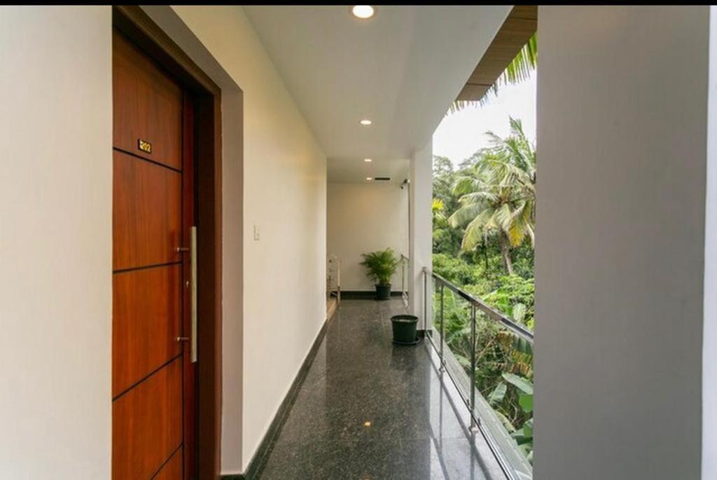 Thenmala Hormuz Inn Kolattupuzha Екстериор снимка