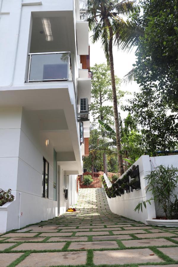 Thenmala Hormuz Inn Kolattupuzha Екстериор снимка