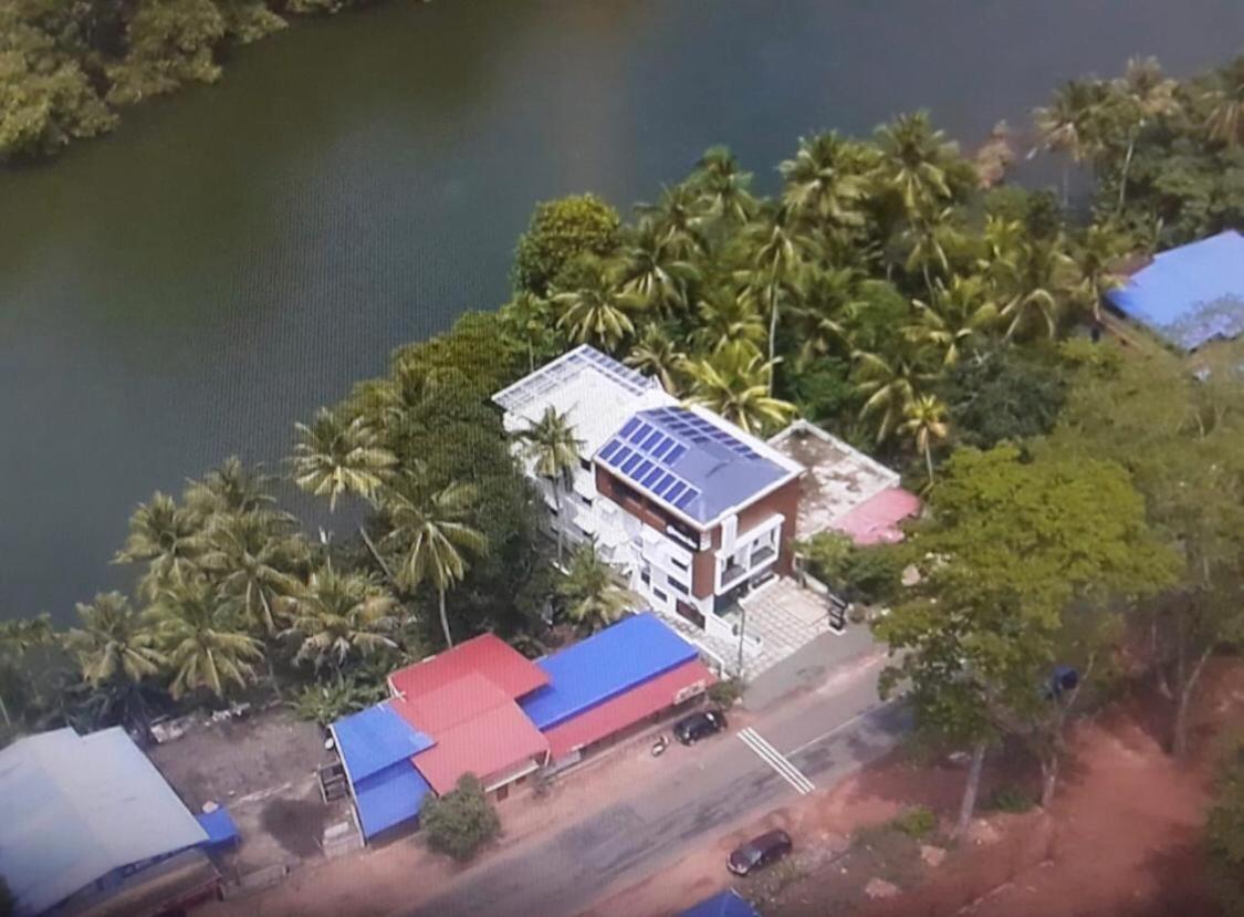 Thenmala Hormuz Inn Kolattupuzha Екстериор снимка