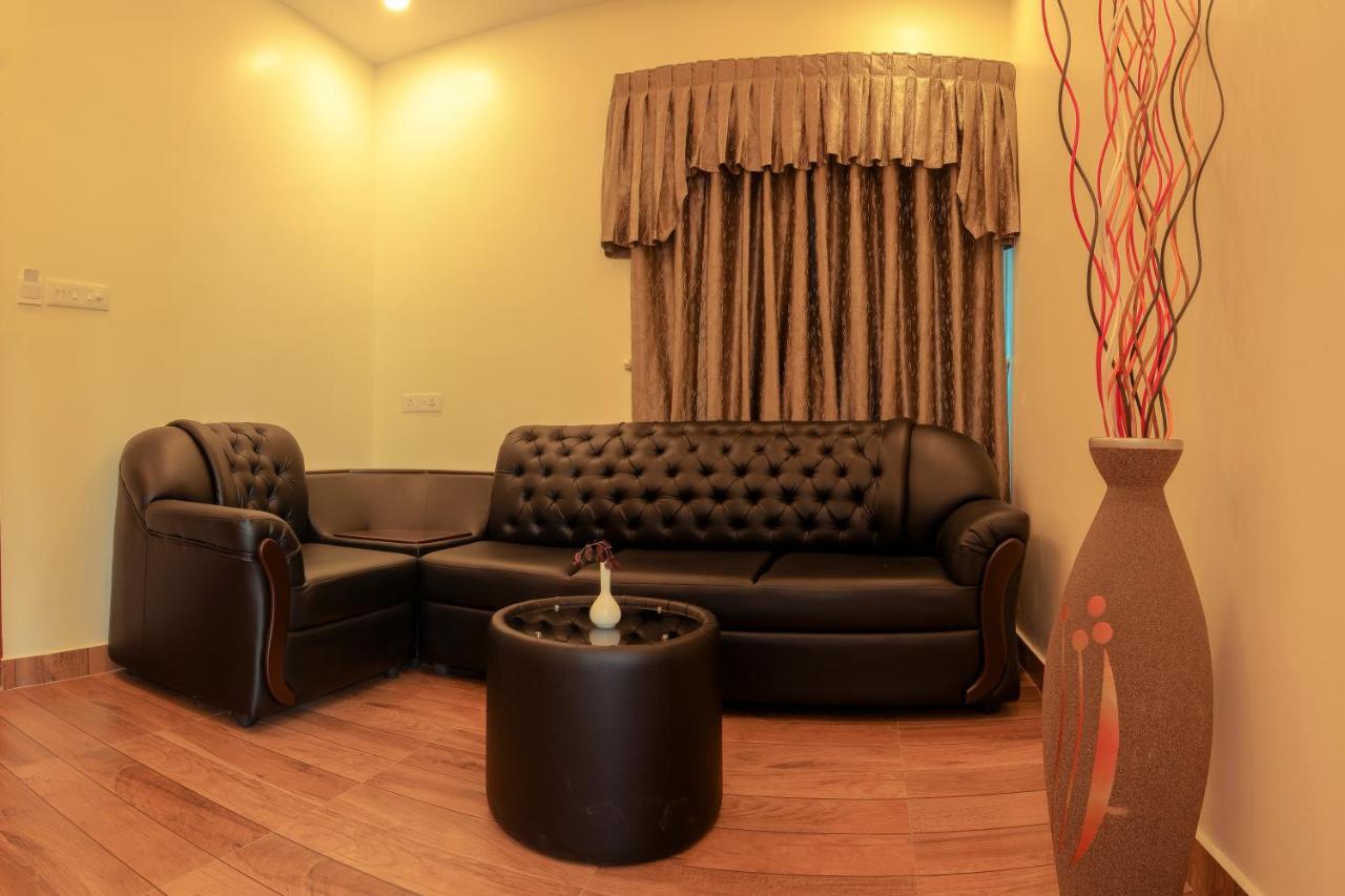 Thenmala Hormuz Inn Kolattupuzha Екстериор снимка
